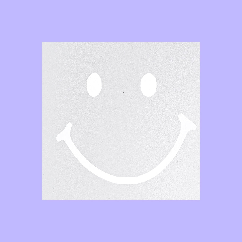 White smiley face on a light purple background