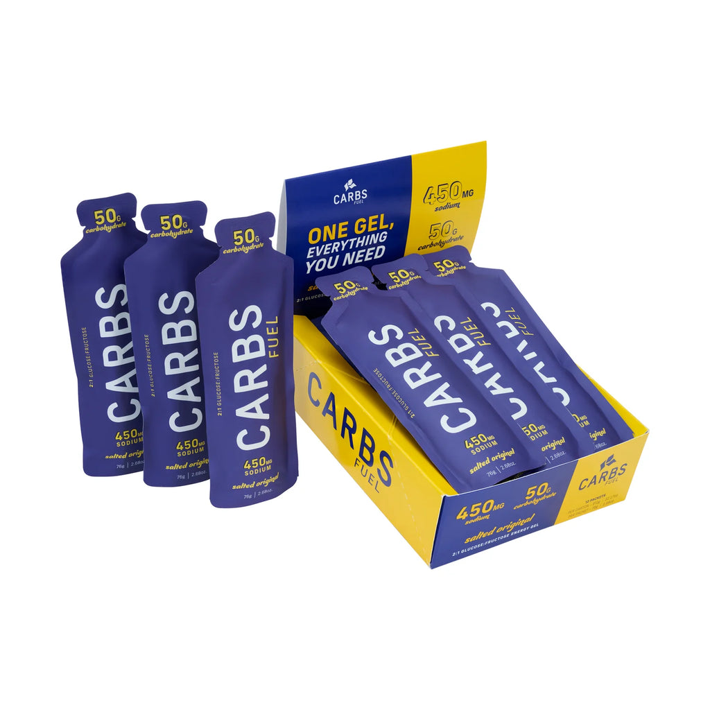 Box of CARBS fuel gels with multiple packets on a white background