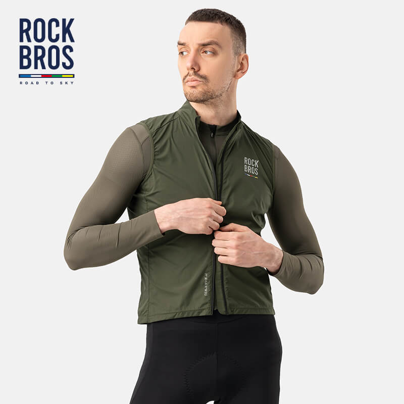 Man wearing a green vest with 'Rock Bros' branding on a white background